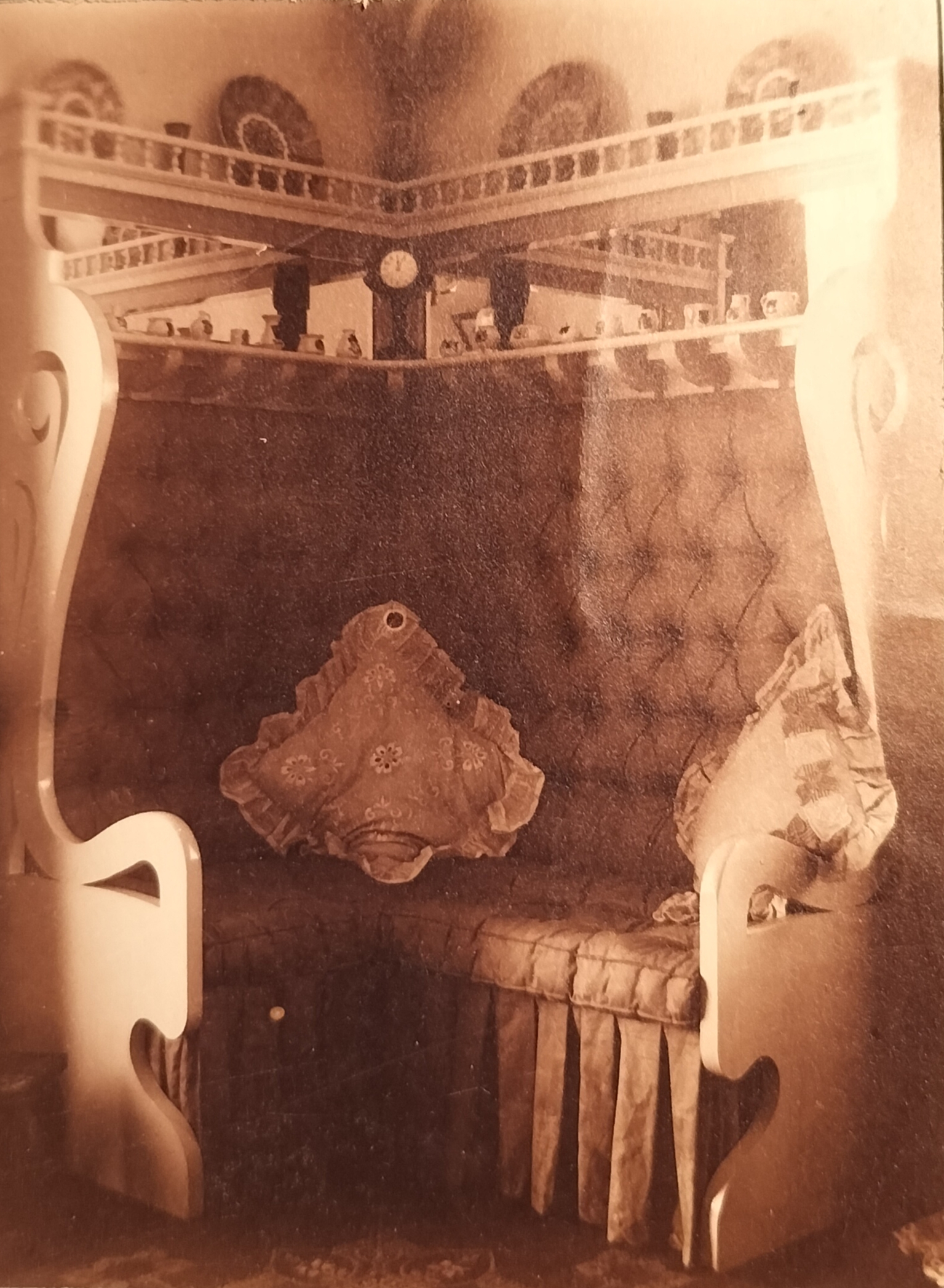 Unique “lover’s bench” which was visible in an earlier photograph. The little clock in the center indicates that the photograph was captured shortly after 12h00 midday.
