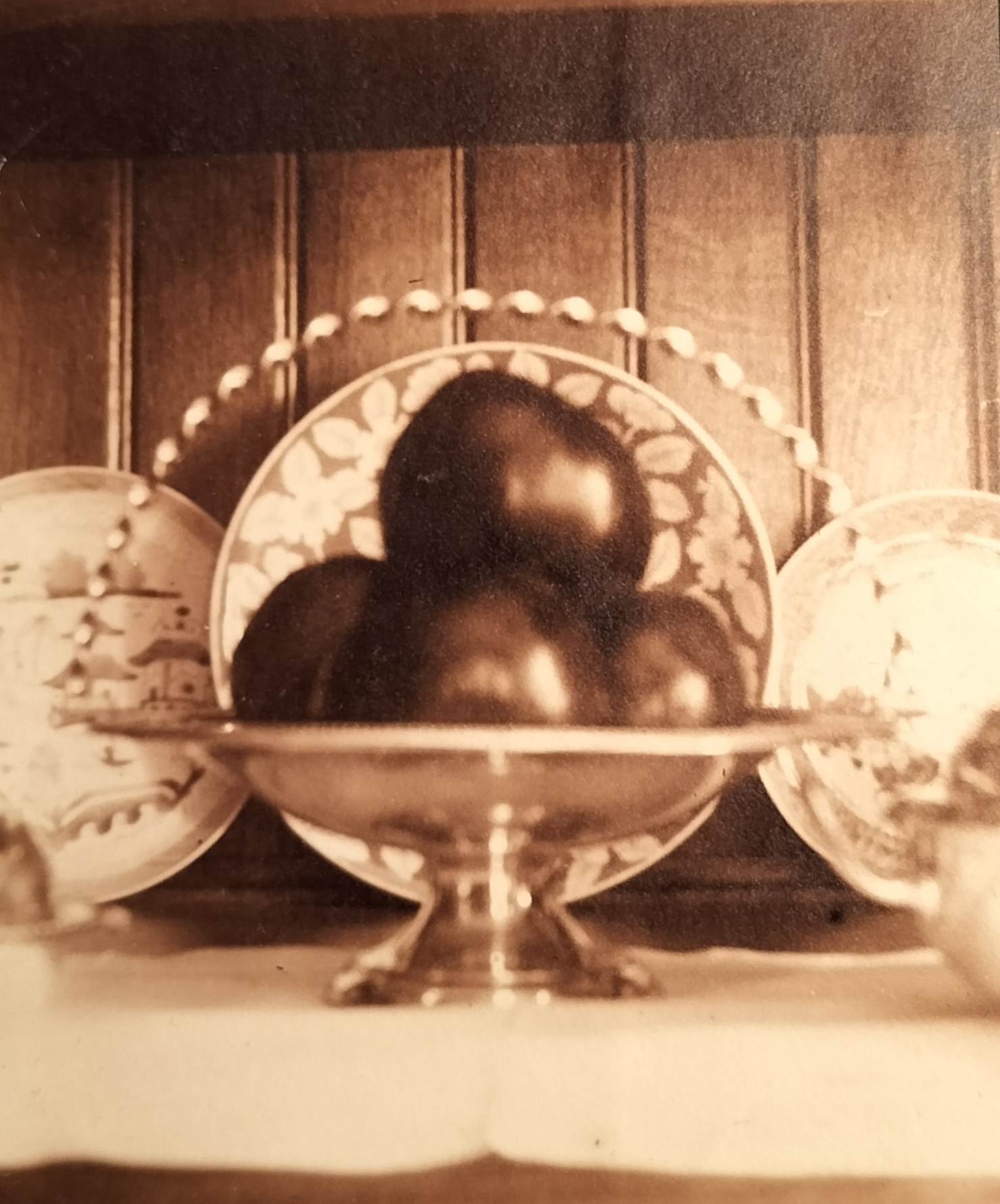 An out of focus abstract of some unknown fruits in the fruit bowl. Note that in the image above that the bowl on which the fruit was placed is empty.