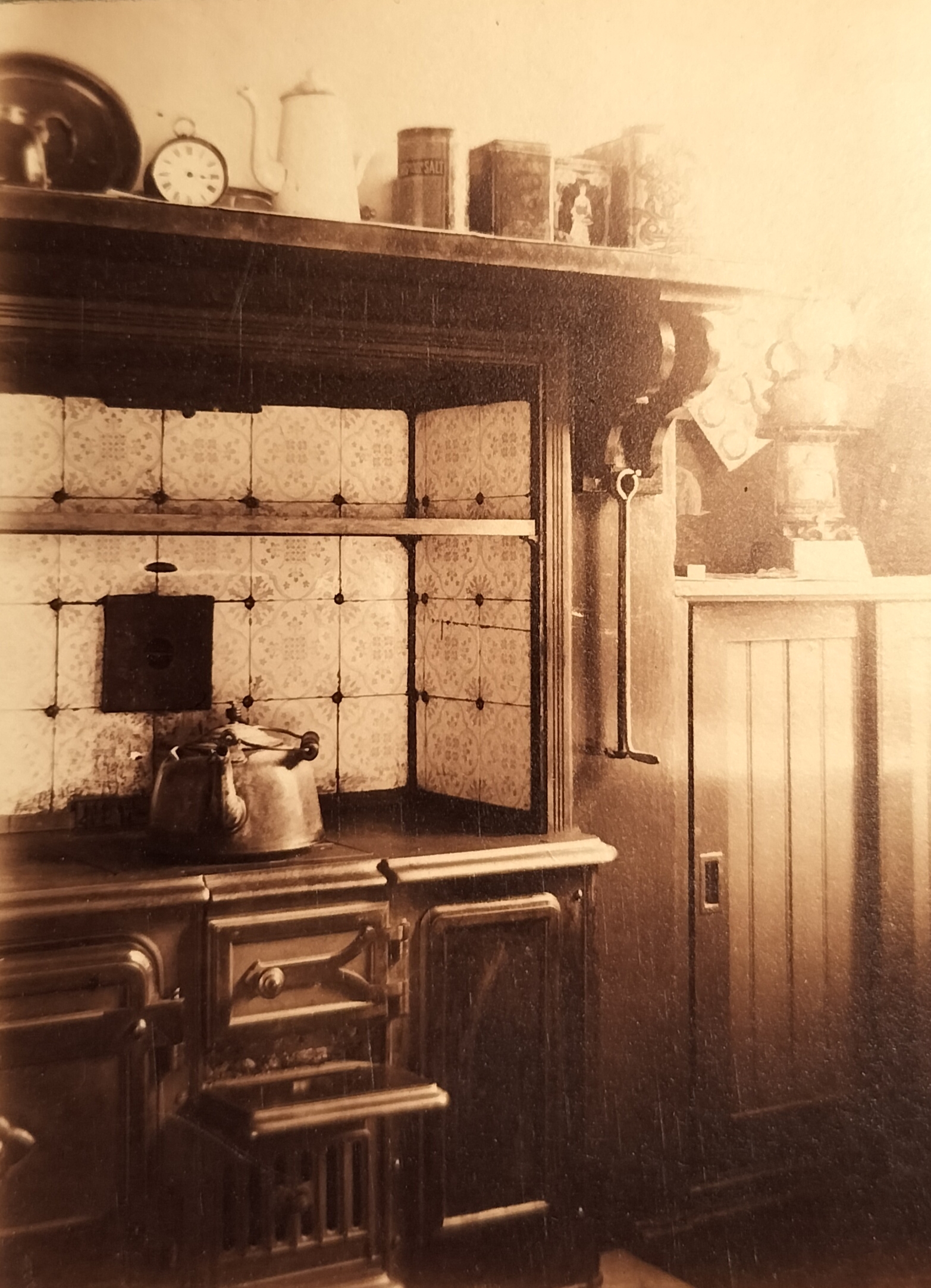 In the kitchen with its large coal stove with a heavy kettle ready to brew the next cup of tea