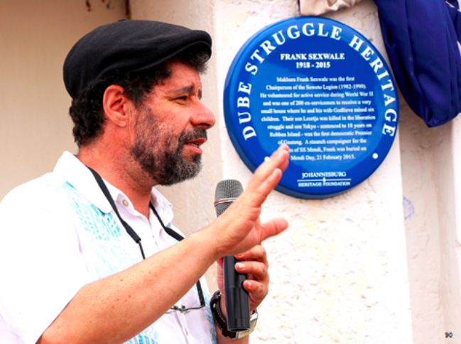 Eric Itzkin speaking at a plaque unveiling event