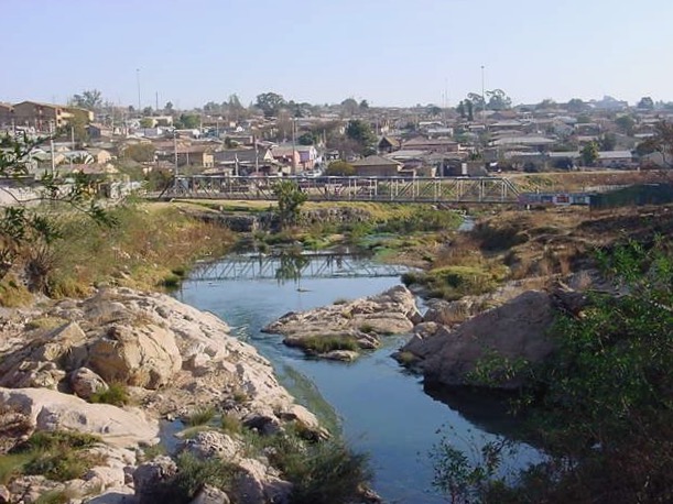 View of Alex across the Jukskei - Lucille Davie