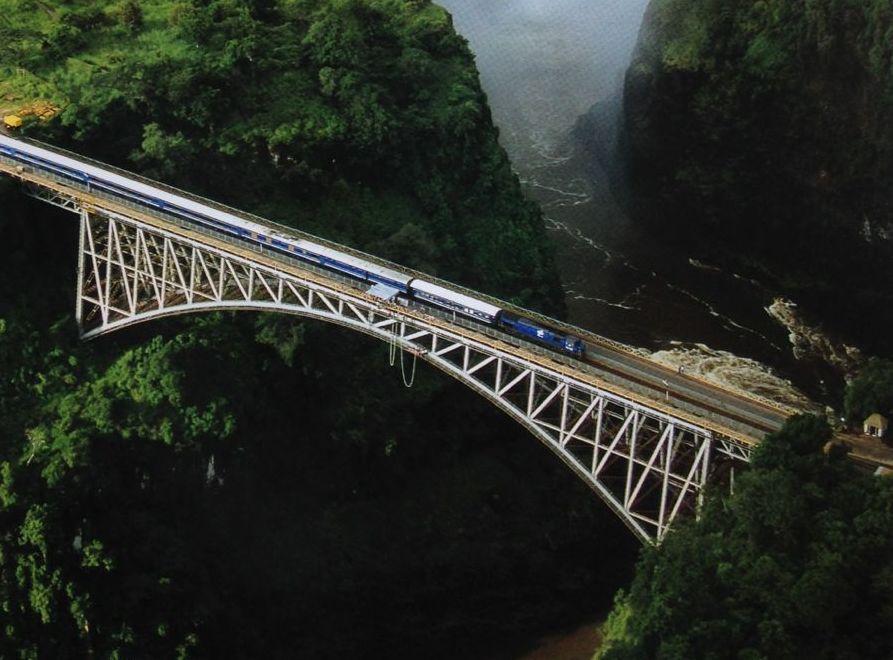 Blue Train moving across Victoria Falls Bridge - Blue Train Gus Silber - cropped