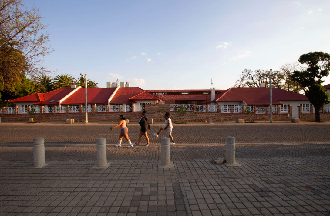 The restored cottages and fence as seen from Mary Fitzgerald Square - Mayat Hart Architects