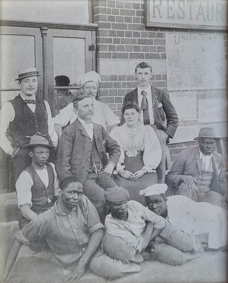Fiebiger and wife with Vereeniging railway station restaurant employees via Enno Schlecter