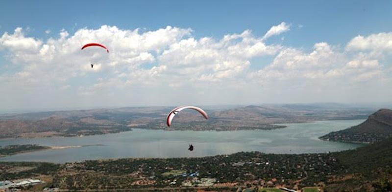Paragliders over Hartbeespoort Dam - John Wesson