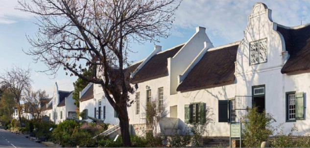The reconstructed splendour of Church Street boasts seven gabled houses in a row along its western side - Norman Collins